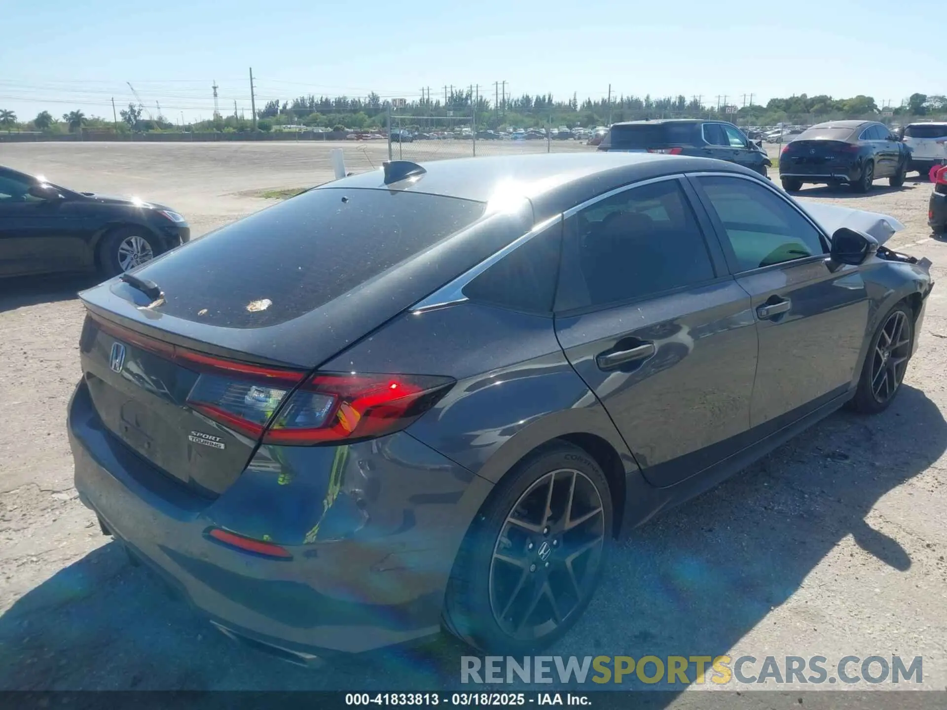 4 Photograph of a damaged car 19XFL1H80PE017819 HONDA CIVIC 2023