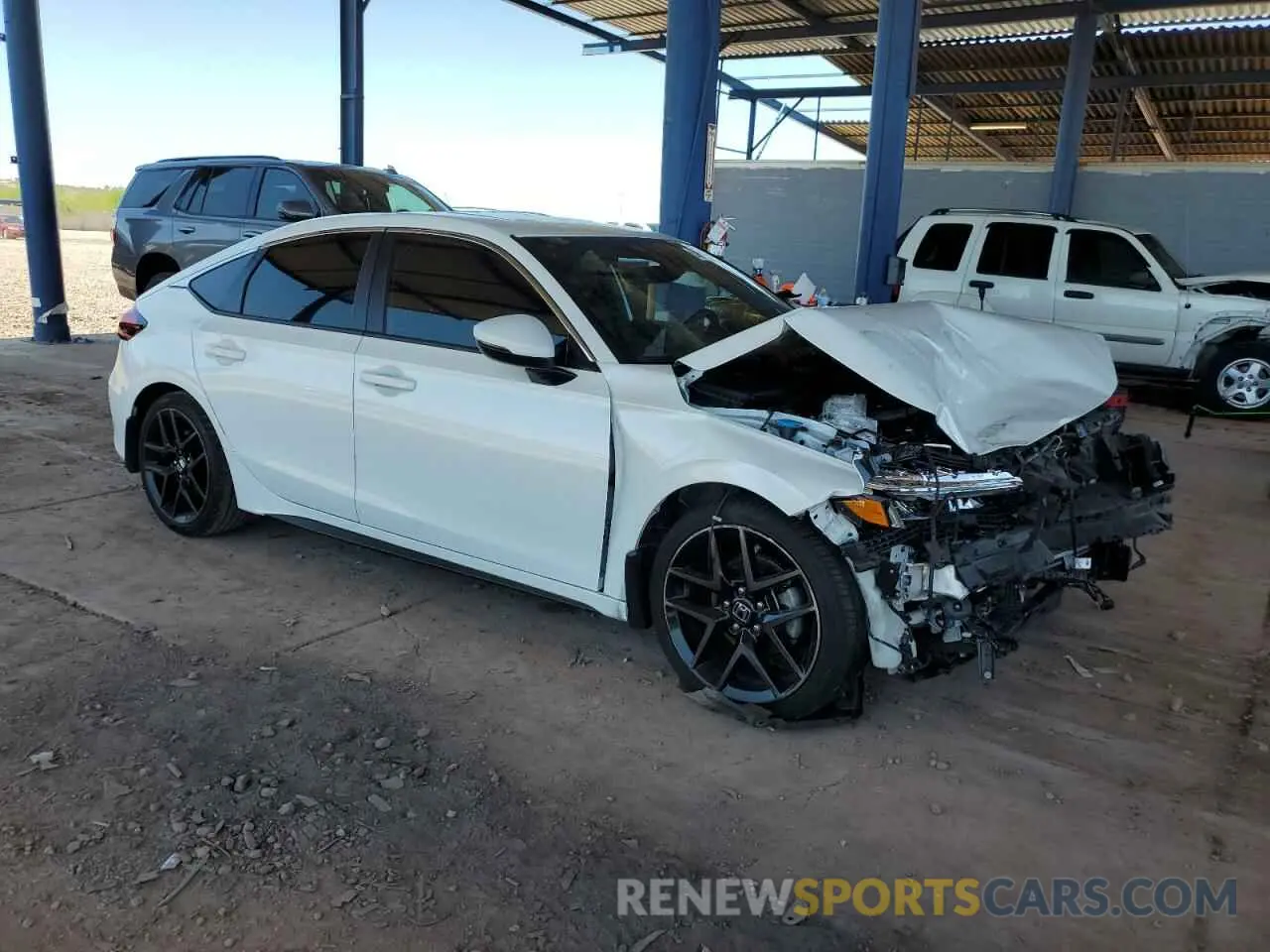 4 Photograph of a damaged car 19XFL1H86PE017548 HONDA CIVIC 2023