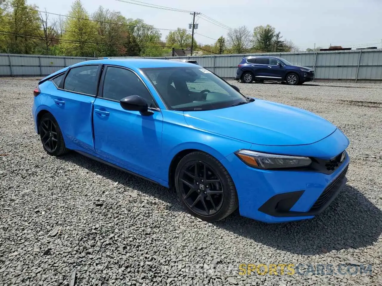 4 Photograph of a damaged car 19XFL2H85PE001931 HONDA CIVIC 2023