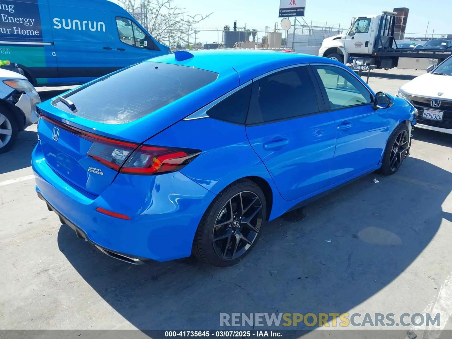 4 Photograph of a damaged car 19XFL1G85RE026665 HONDA CIVIC 2024