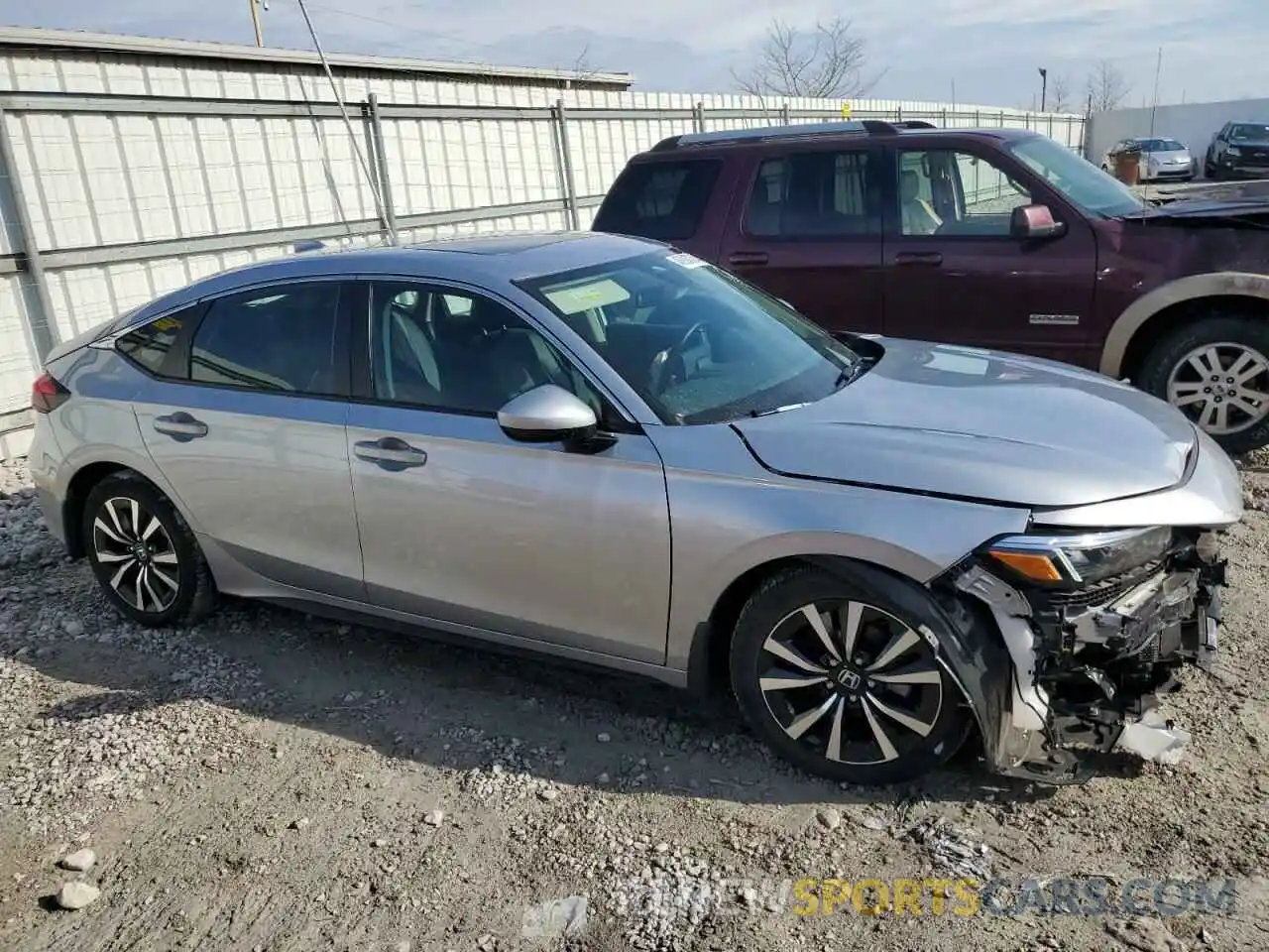 4 Photograph of a damaged car 19XFL1H72RE005519 HONDA CIVIC 2024