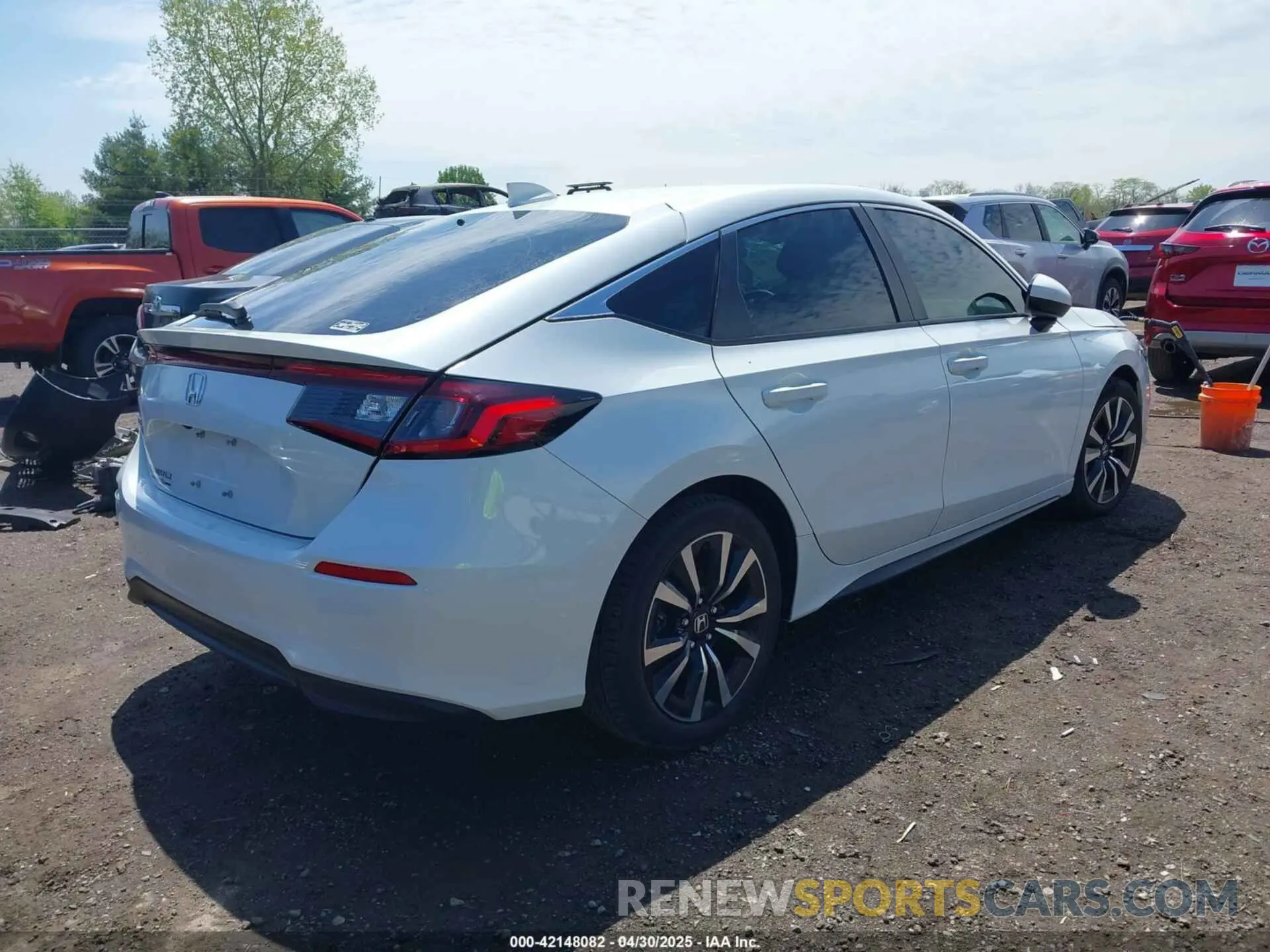 4 Photograph of a damaged car 19XFL1H73RE017291 HONDA CIVIC 2024