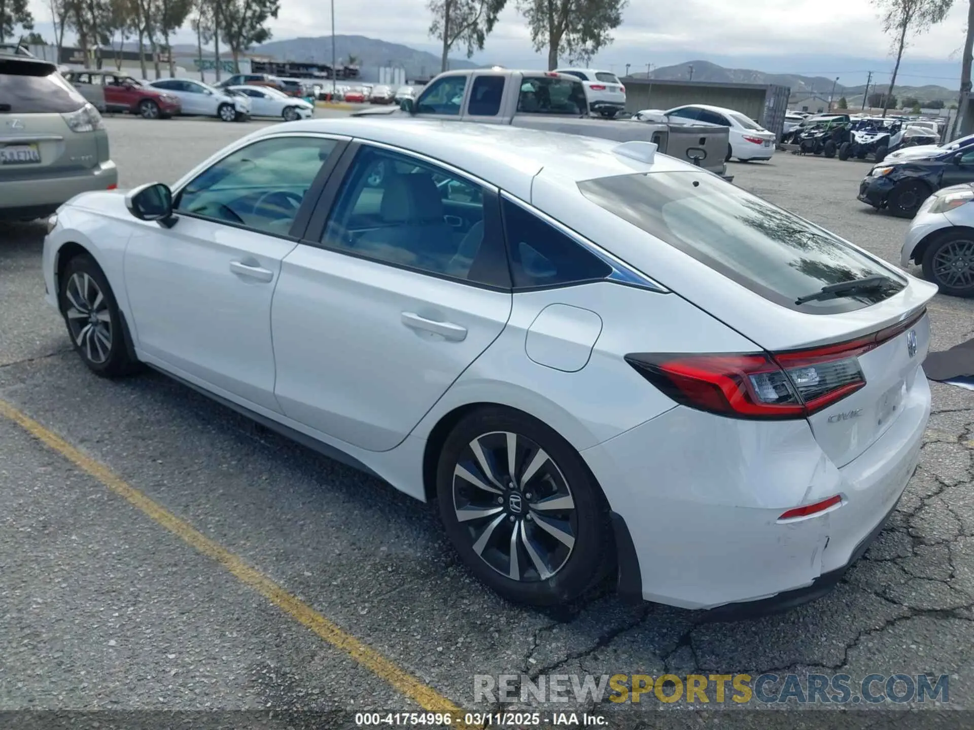 3 Photograph of a damaged car 19XFL1H78RE010689 HONDA CIVIC 2024