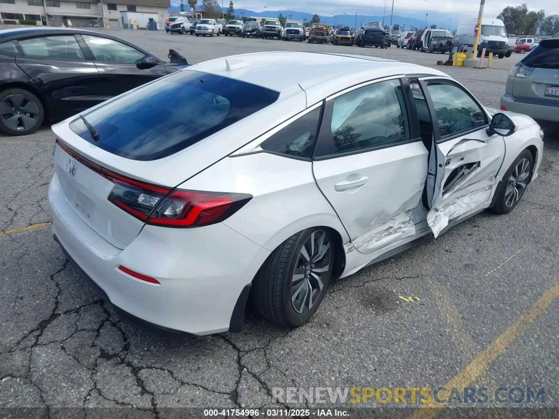 4 Photograph of a damaged car 19XFL1H78RE010689 HONDA CIVIC 2024