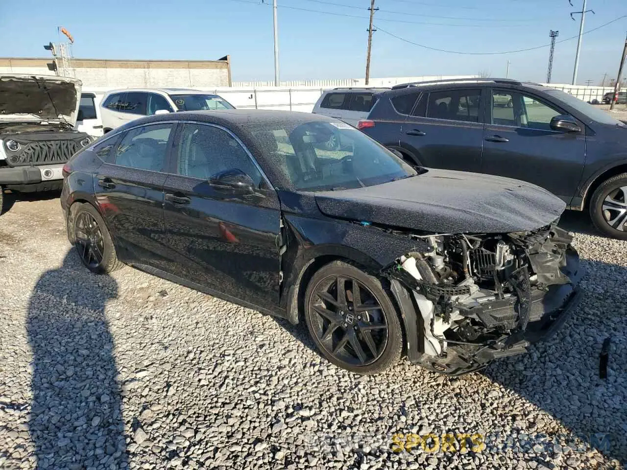 4 Photograph of a damaged car 19XFL1H81RE013023 HONDA CIVIC 2024