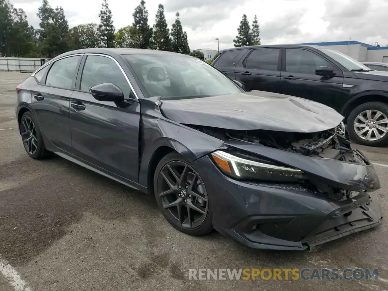 4 Photograph of a damaged car 19XFL1H87RE027203 HONDA CIVIC 2024