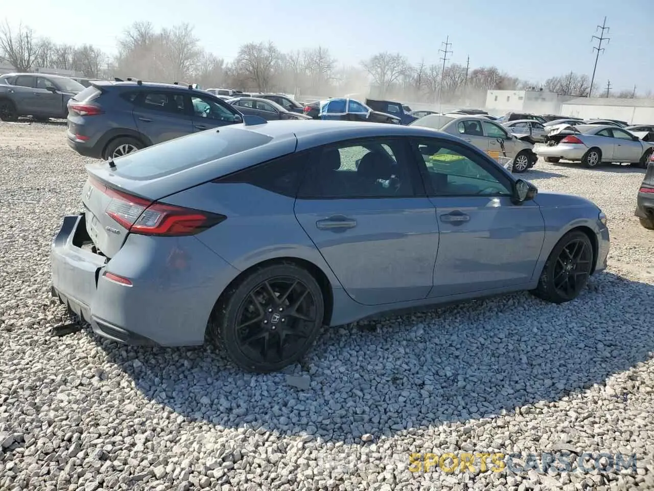 3 Photograph of a damaged car 19XFL2H84RE005004 HONDA CIVIC 2024