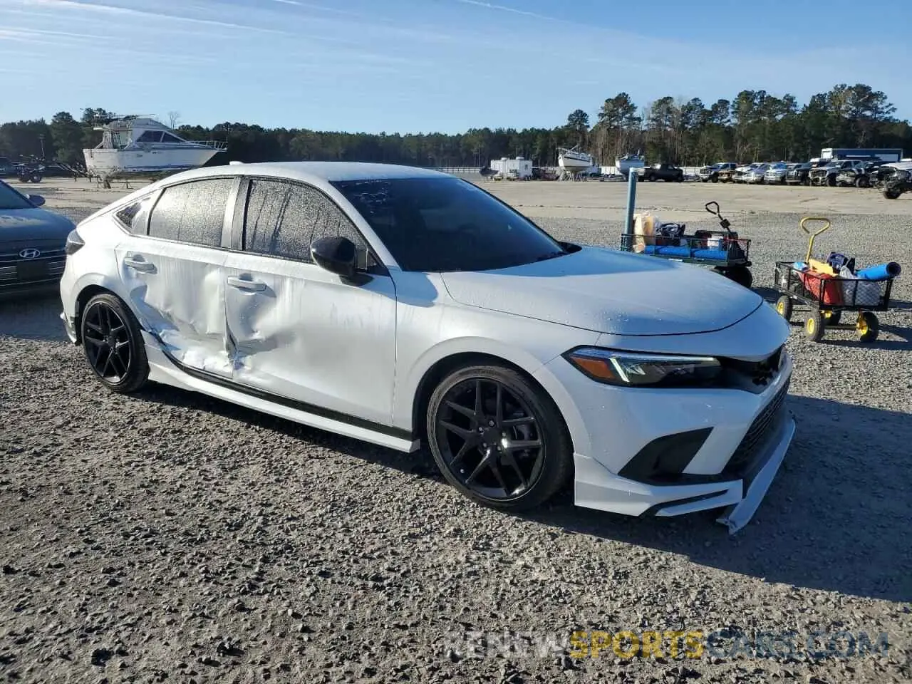 4 Photograph of a damaged car 19XFL2H86RE031586 HONDA CIVIC 2024