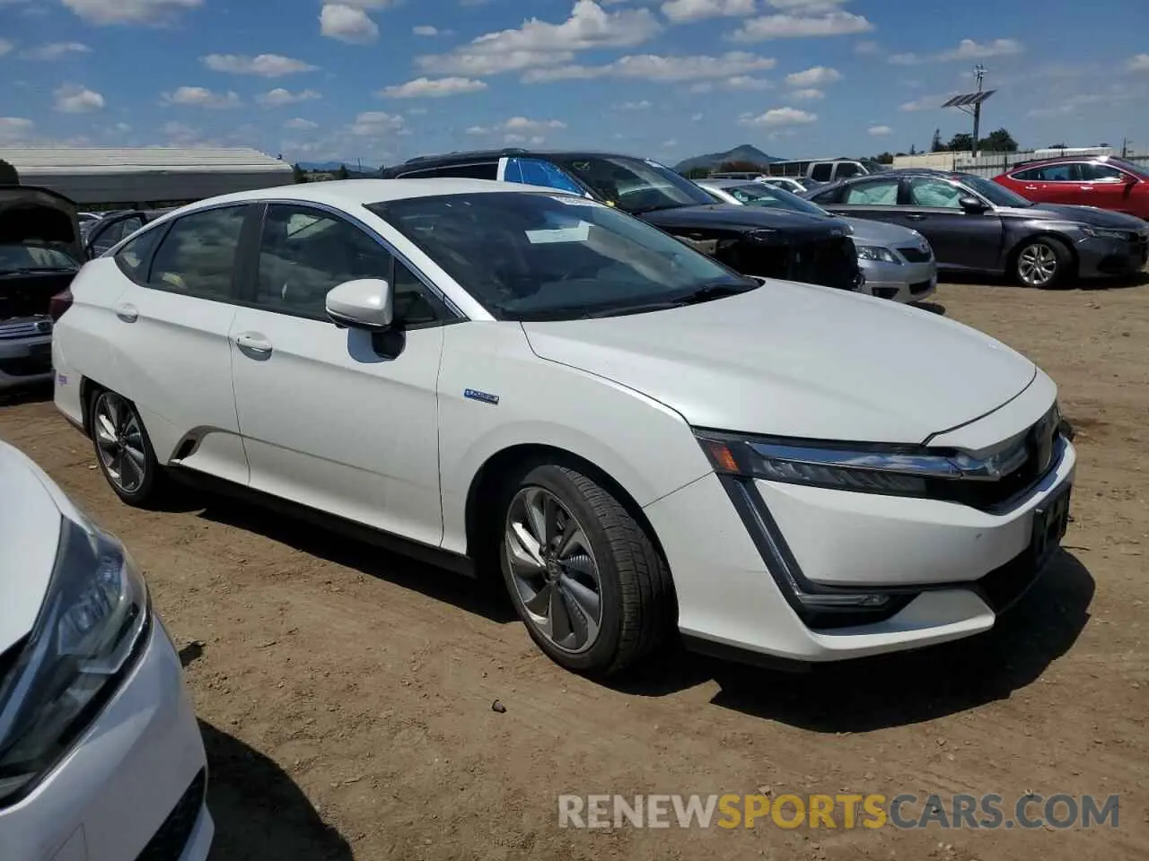 4 Photograph of a damaged car JHMZC5F10KC004142 HONDA CLARITY 2019