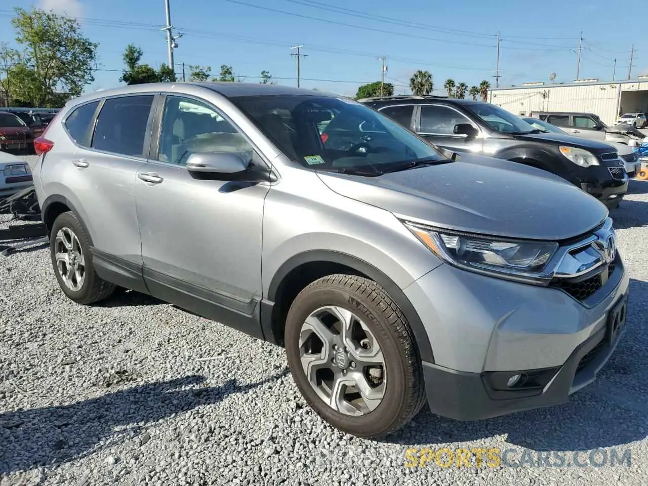 4 Photograph of a damaged car 2HKRW2H50KH654603 HONDA CRV 2019