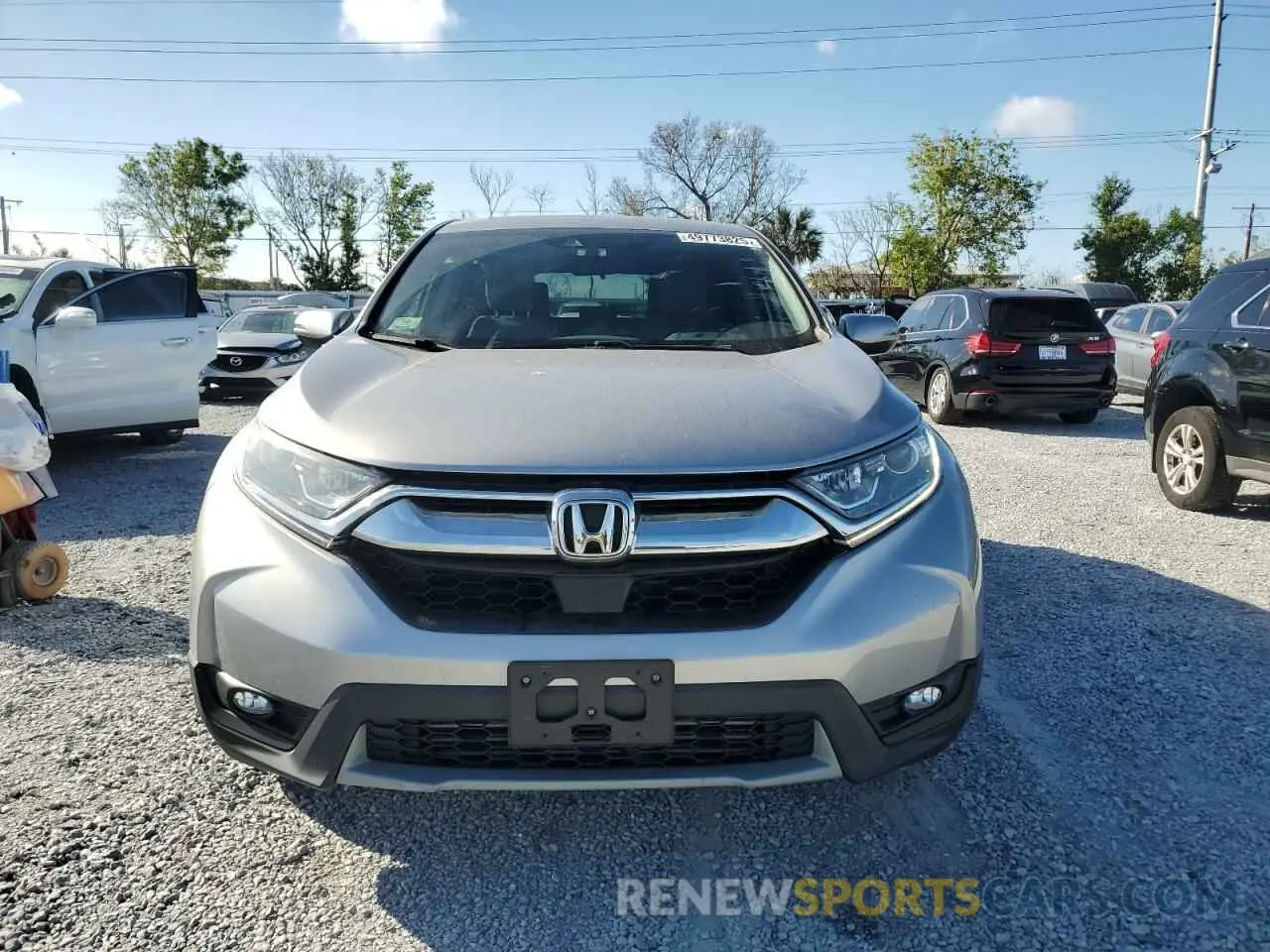 5 Photograph of a damaged car 2HKRW2H50KH654603 HONDA CRV 2019