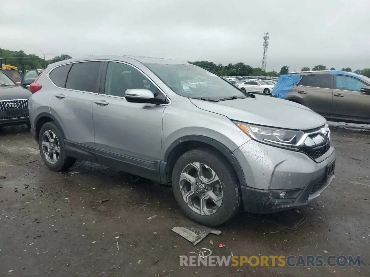 4 Photograph of a damaged car 2HKRW2H51KH609282 HONDA CRV 2019