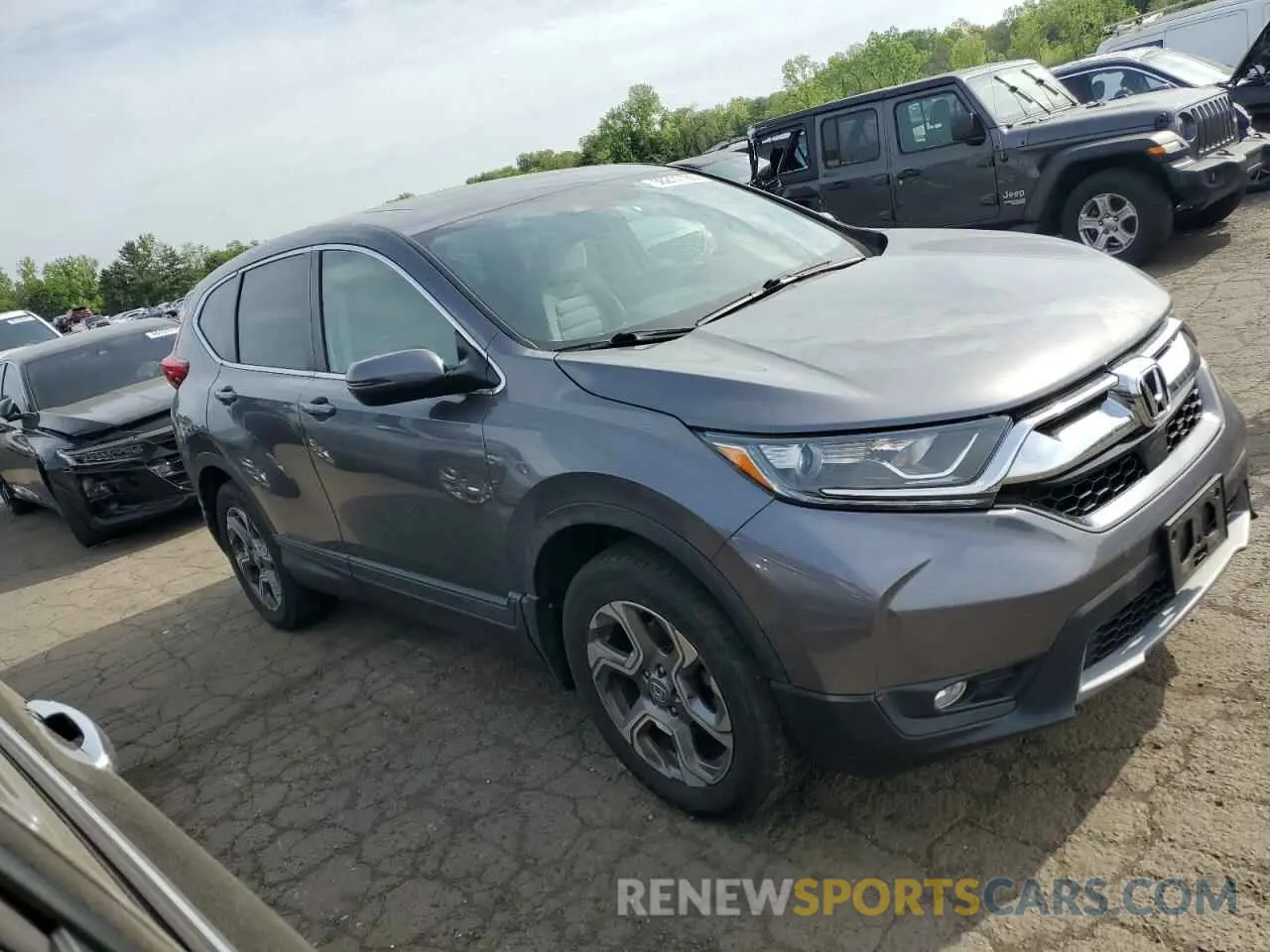 4 Photograph of a damaged car 2HKRW2H52KH609484 HONDA CRV 2019