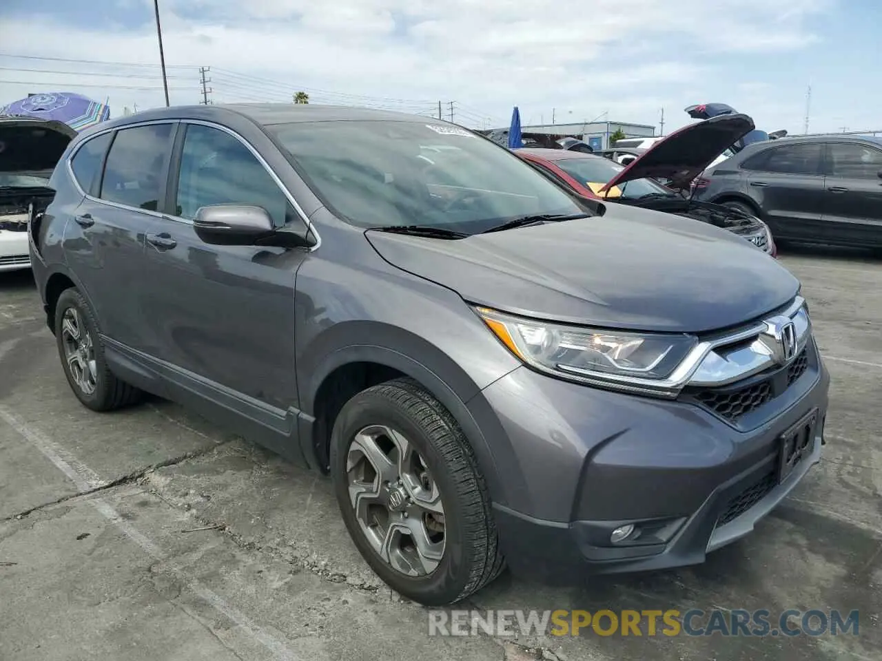 4 Photograph of a damaged car 2HKRW2H59KH650565 HONDA CRV 2019