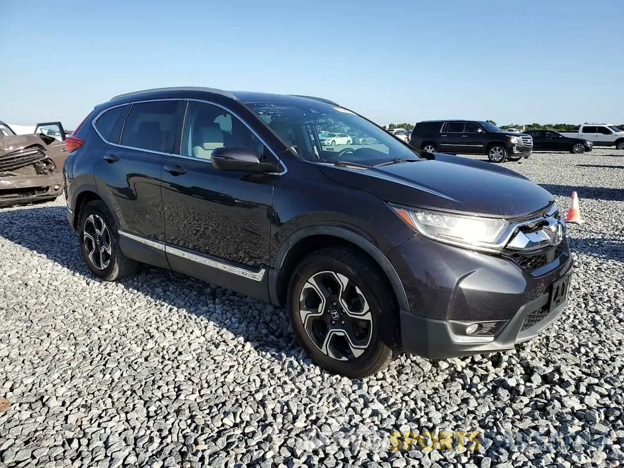 4 Photograph of a damaged car 2HKRW2H91KH625453 HONDA CRV 2019