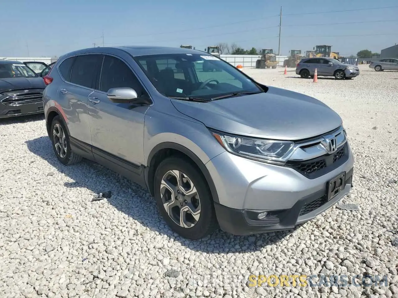 4 Photograph of a damaged car 5J6RW1H52KA016199 HONDA CRV 2019