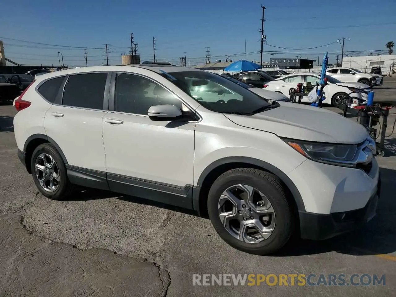 4 Photograph of a damaged car 5J6RW1H55KA004578 HONDA CRV 2019