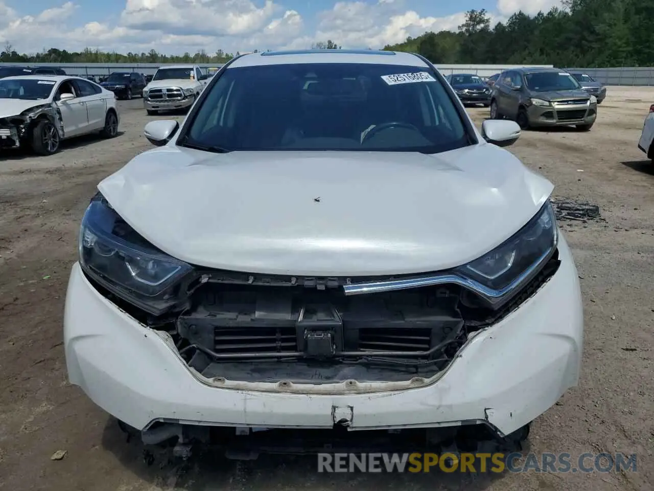 5 Photograph of a damaged car 5J6RW1H84KA016621 HONDA CRV 2019