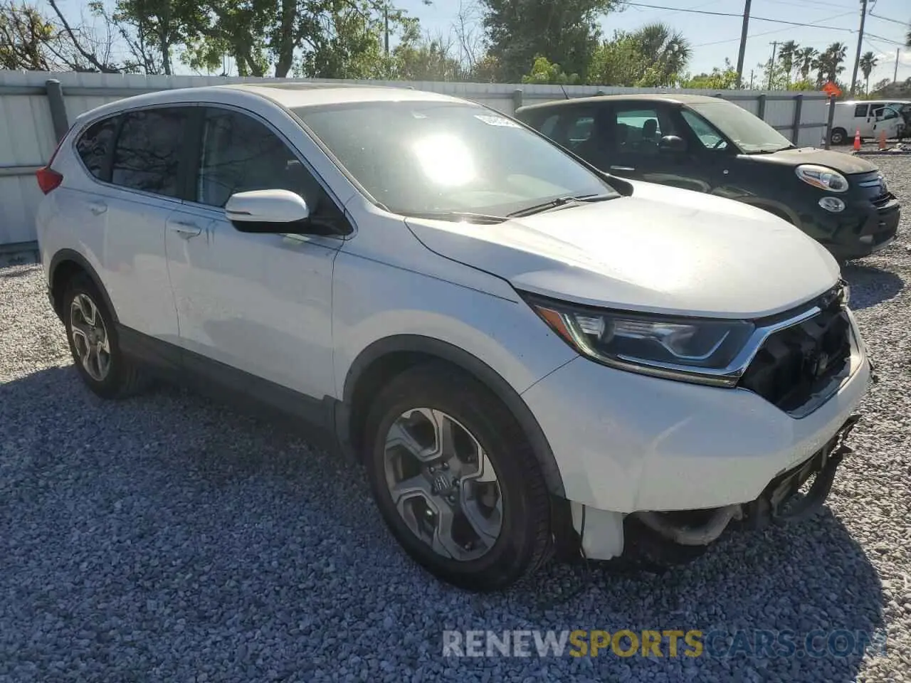 4 Photograph of a damaged car 5J6RW1H85KA041530 HONDA CRV 2019
