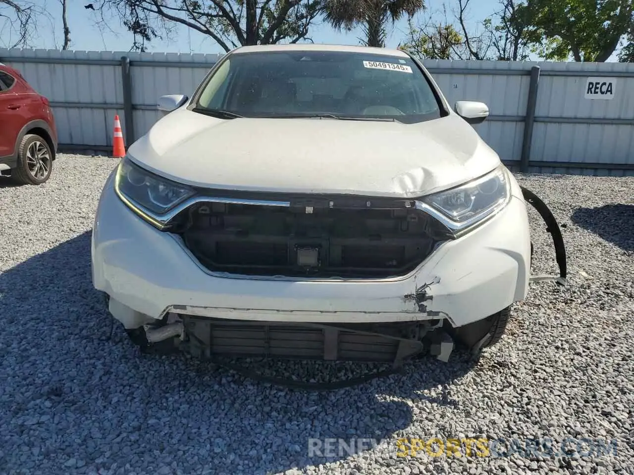 5 Photograph of a damaged car 5J6RW1H85KA041530 HONDA CRV 2019