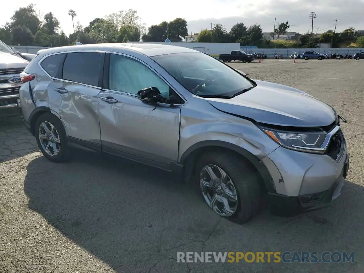 4 Photograph of a damaged car 5J6RW1H86KA048051 HONDA CRV 2019