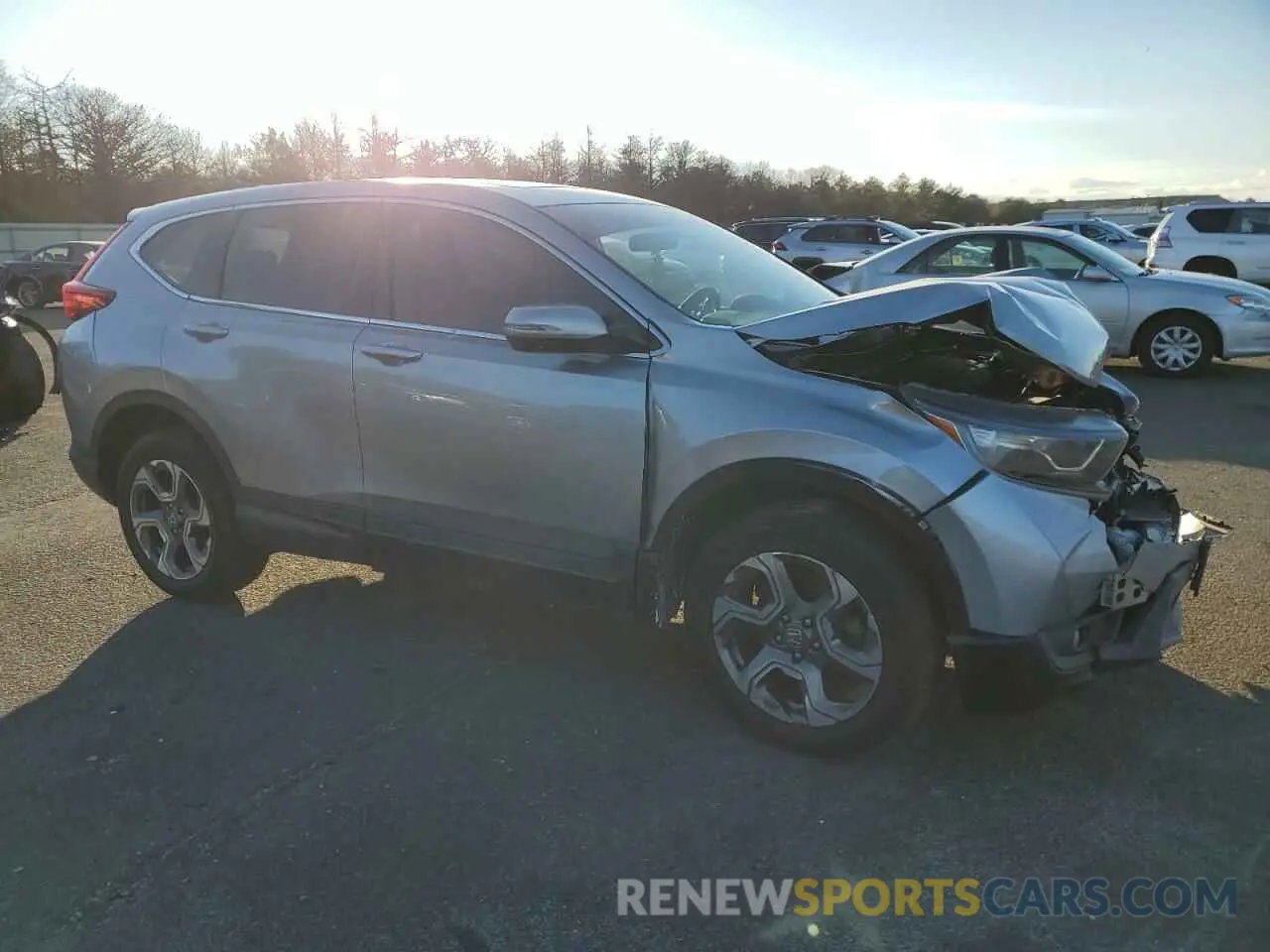 4 Photograph of a damaged car 5J6RW2H52KL010090 HONDA CRV 2019