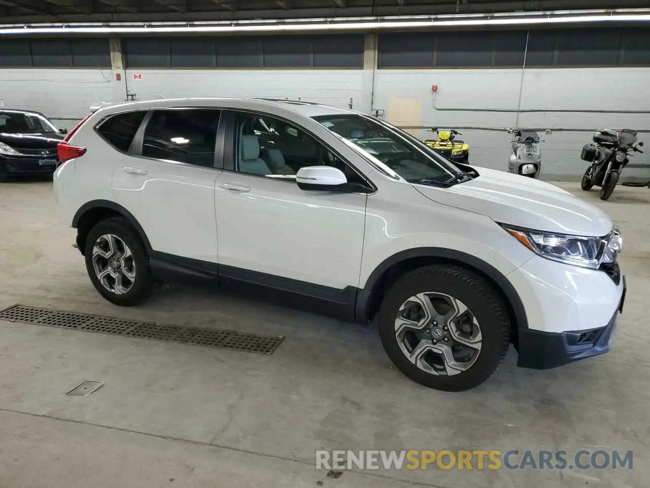 4 Photograph of a damaged car 5J6RW2H82KL012609 HONDA CRV 2019