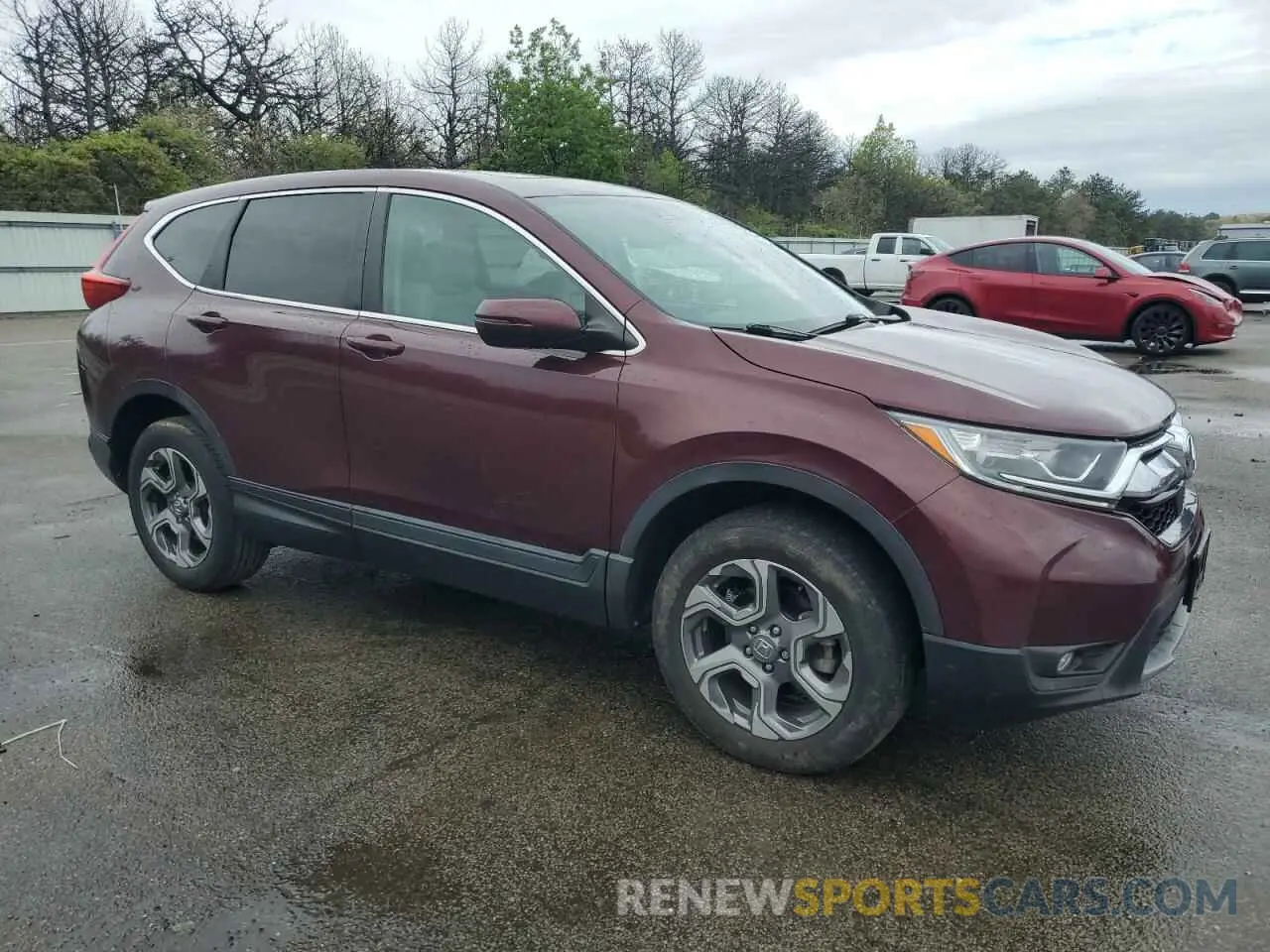 4 Photograph of a damaged car 5J6RW2H85KL011700 HONDA CRV 2019
