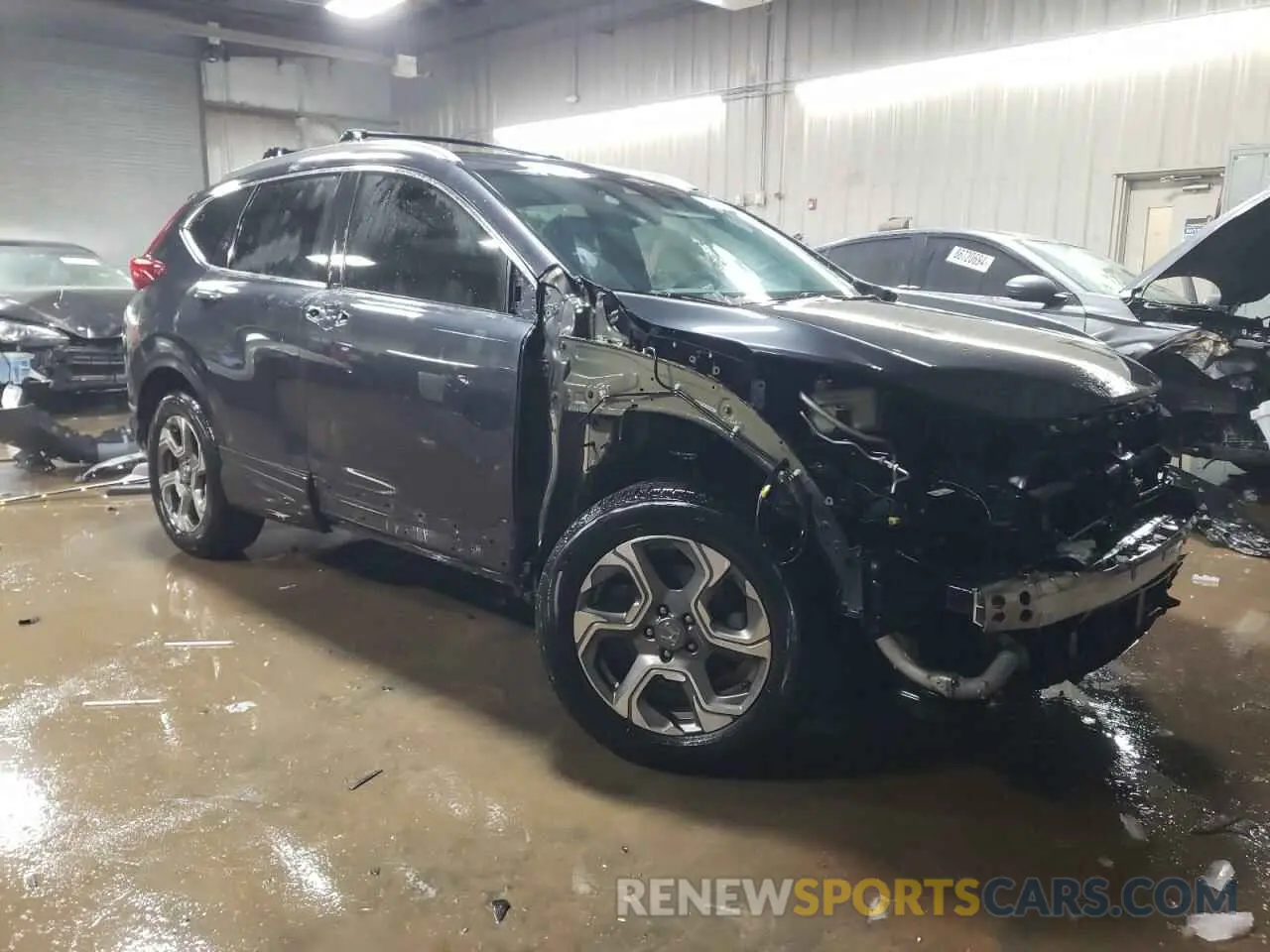 4 Photograph of a damaged car 5J6RW2H89KL003910 HONDA CRV 2019