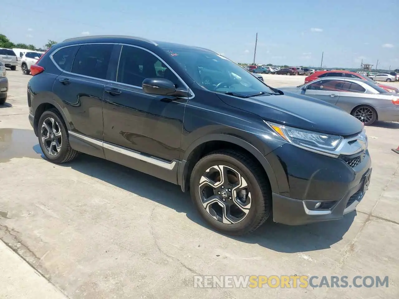 4 Photograph of a damaged car 5J6RW2H96KL006580 HONDA CRV 2019