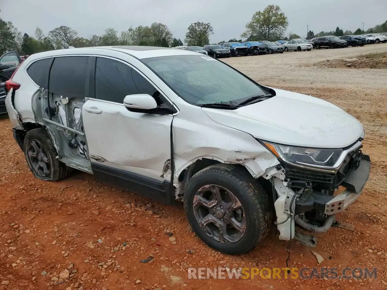 4 Photograph of a damaged car 7FARW1H5XKE019711 HONDA CRV 2019