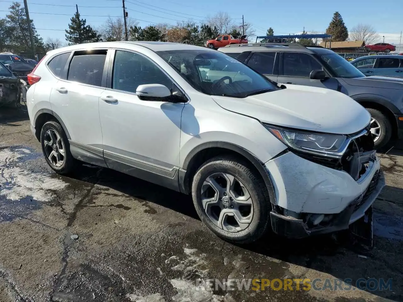 4 Photograph of a damaged car JHLRW2H57KX009938 HONDA CRV 2019