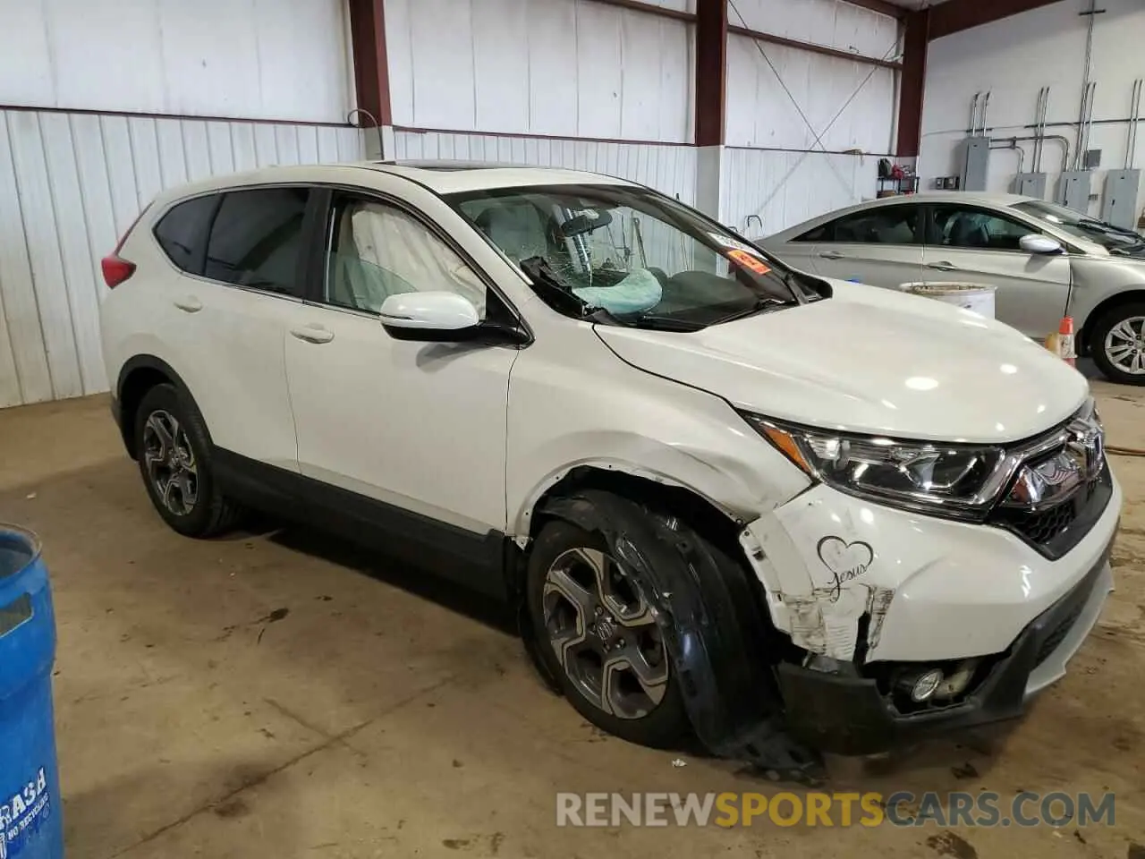 4 Photograph of a damaged car JHLRW2H58KX018891 HONDA CRV 2019