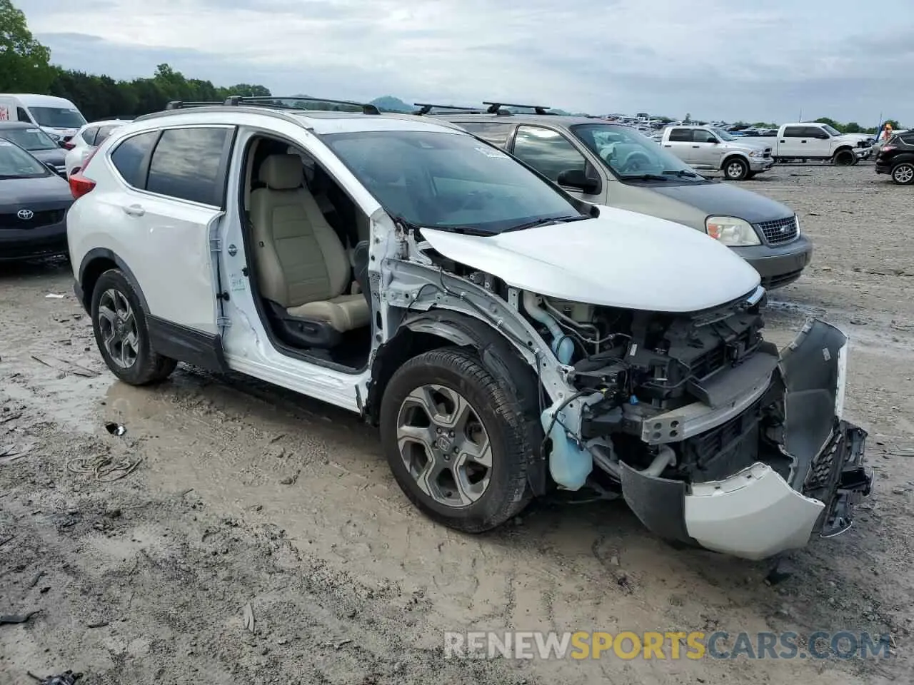 4 Photograph of a damaged car JHLRW2H83KX023345 HONDA CRV 2019