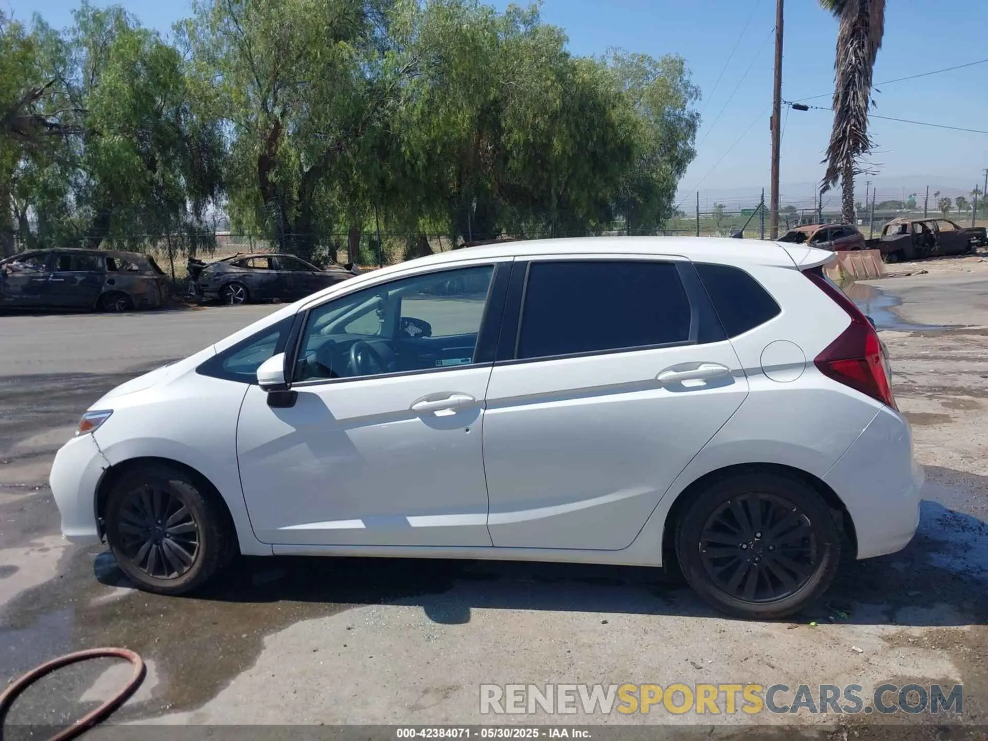 14 Photograph of a damaged car 3HGGK5H4XKM703328 HONDA FIT 2019