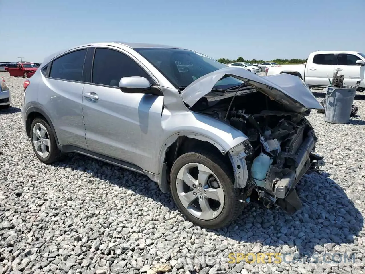 4 Photograph of a damaged car 3CZRU5H34KG706405 HONDA HR-V 2019