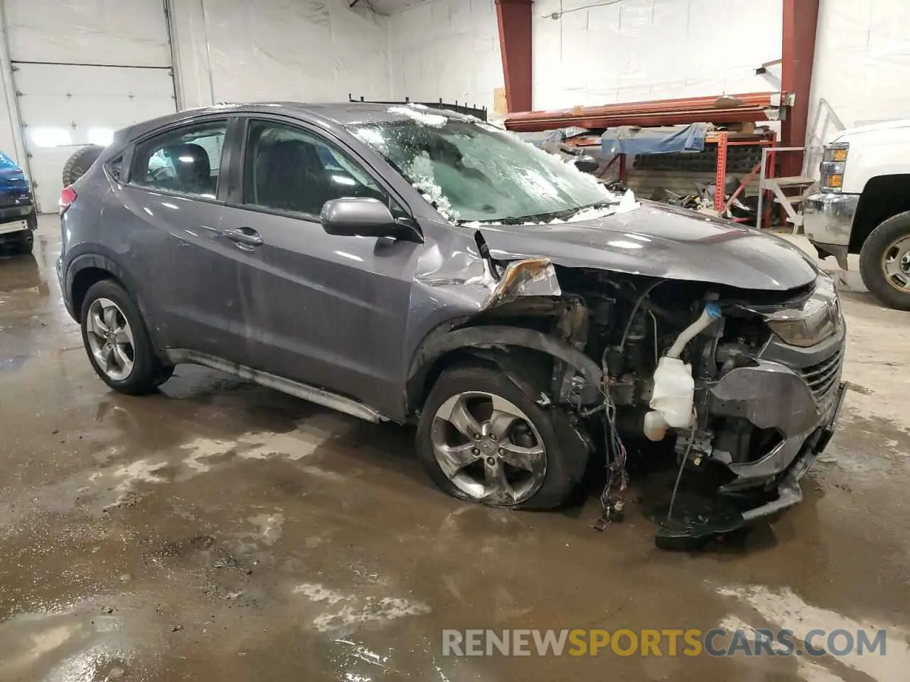 4 Photograph of a damaged car 3CZRU6H39KG716160 HONDA HR-V 2019