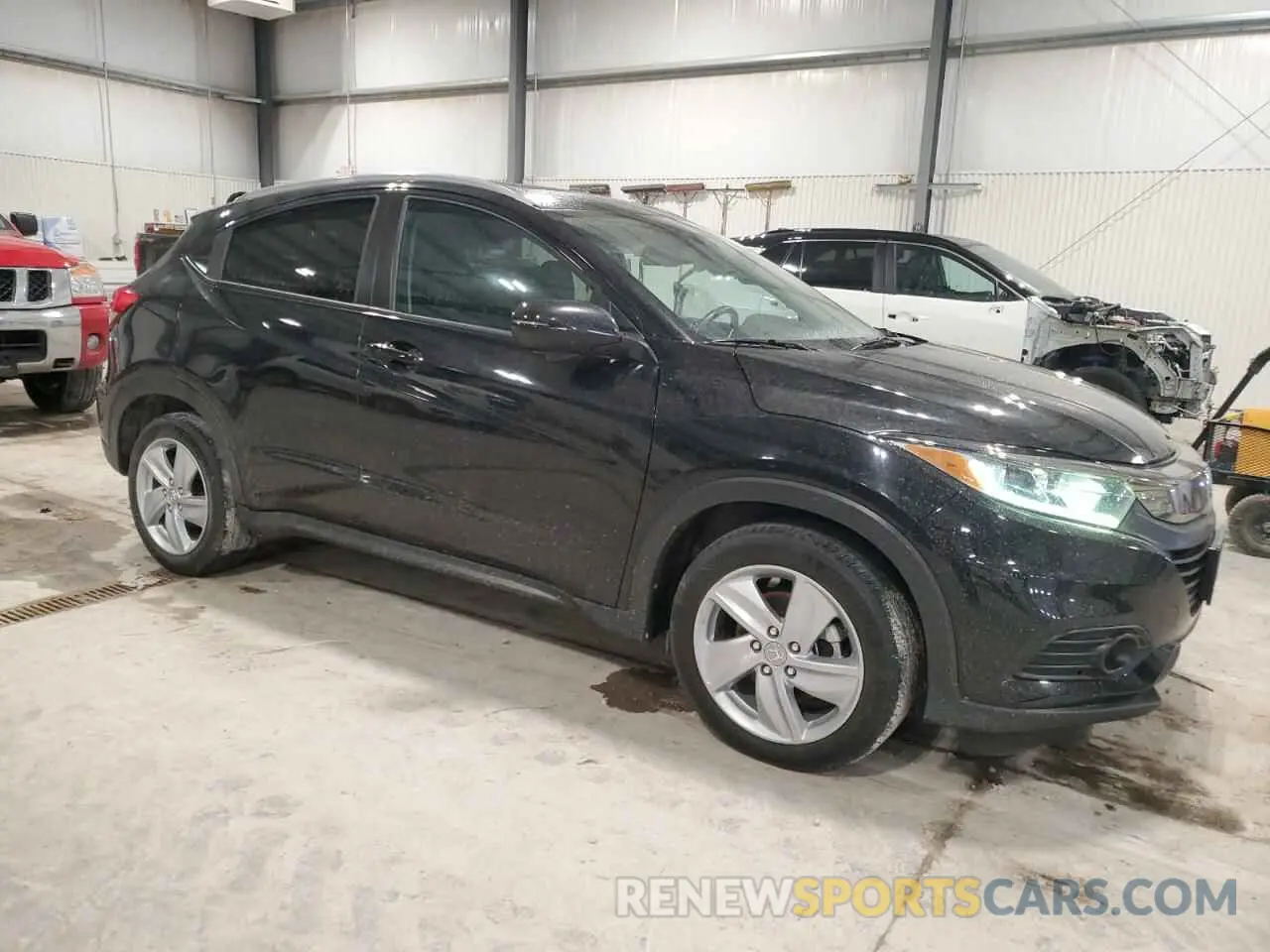 4 Photograph of a damaged car 3CZRU6H74KM703594 HONDA HR-V 2019