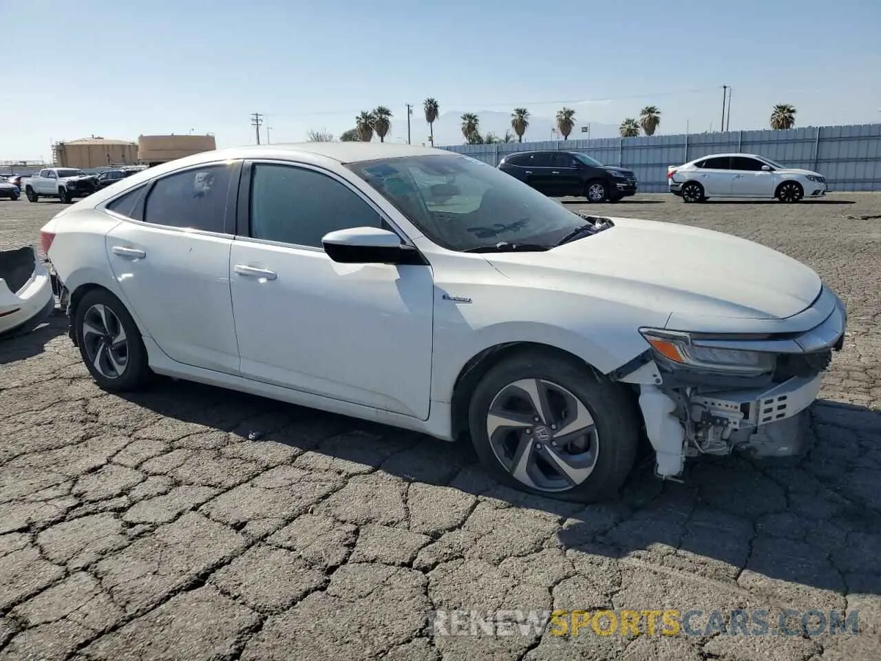 4 Photograph of a damaged car 19XZE4F17KE021048 HONDA INSIGHT 2019