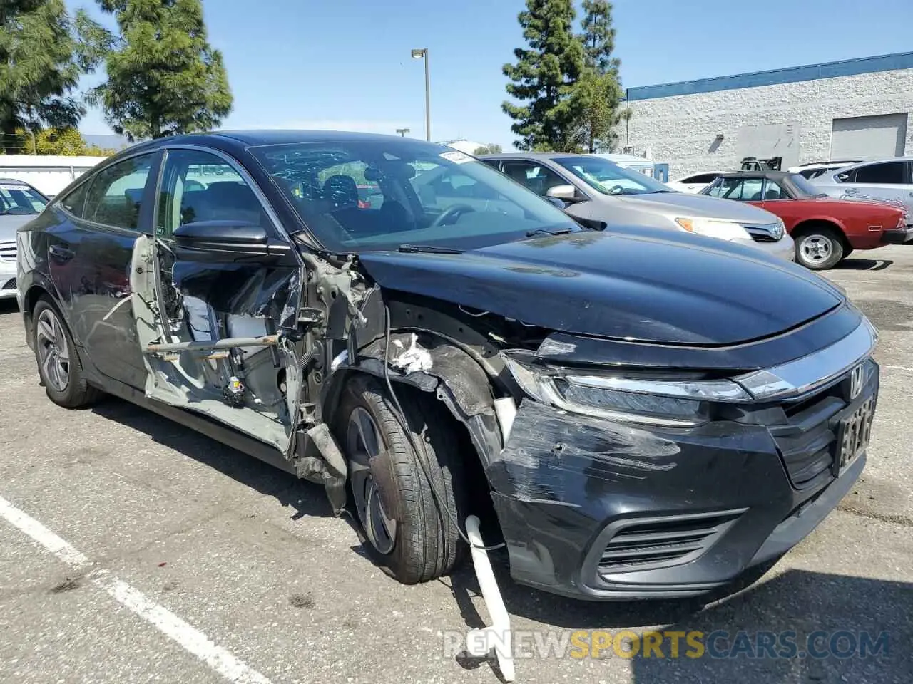 4 Photograph of a damaged car 19XZE4F50KE026174 HONDA INSIGHT 2019