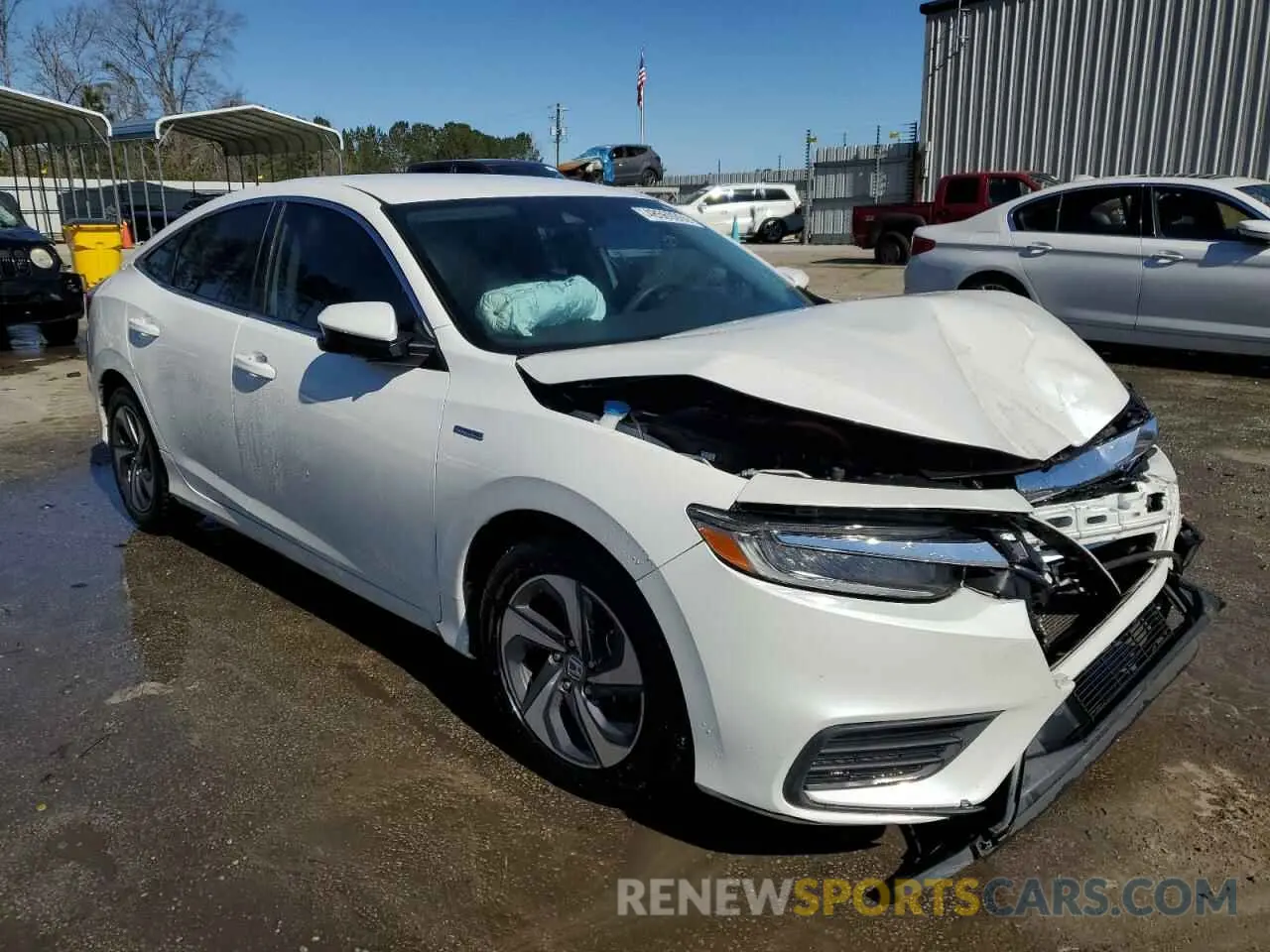 4 Photograph of a damaged car 19XZE4F50KE033304 HONDA INSIGHT 2019