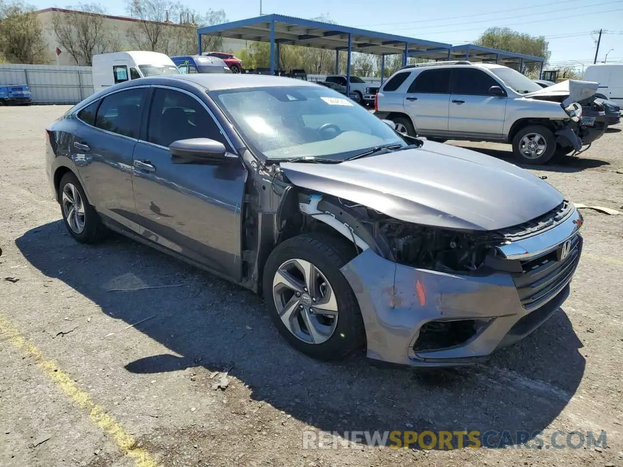 4 Photograph of a damaged car 19XZE4F52KE033983 HONDA INSIGHT 2019
