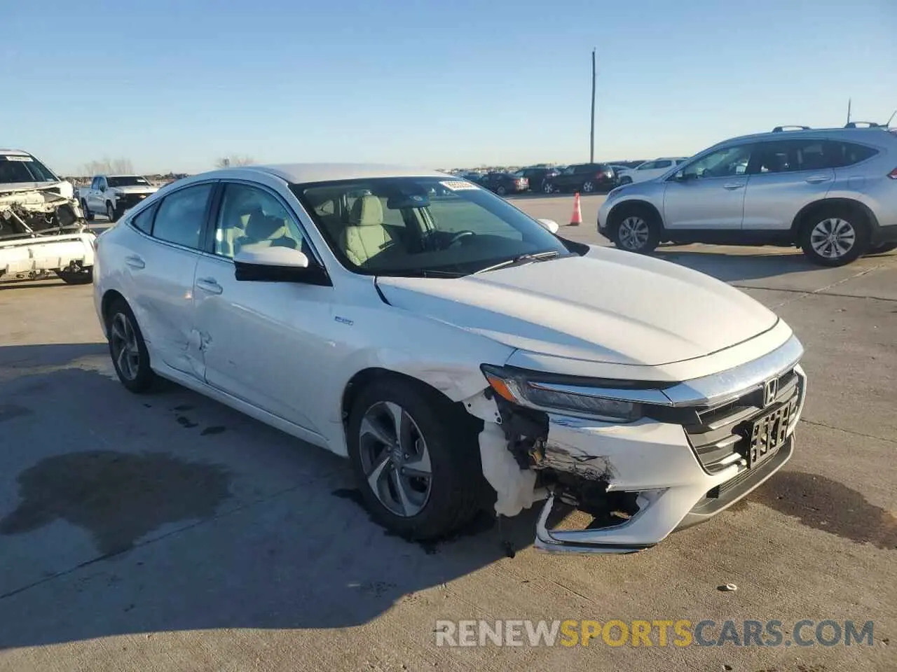 4 Photograph of a damaged car 19XZE4F55KE028941 HONDA INSIGHT 2019