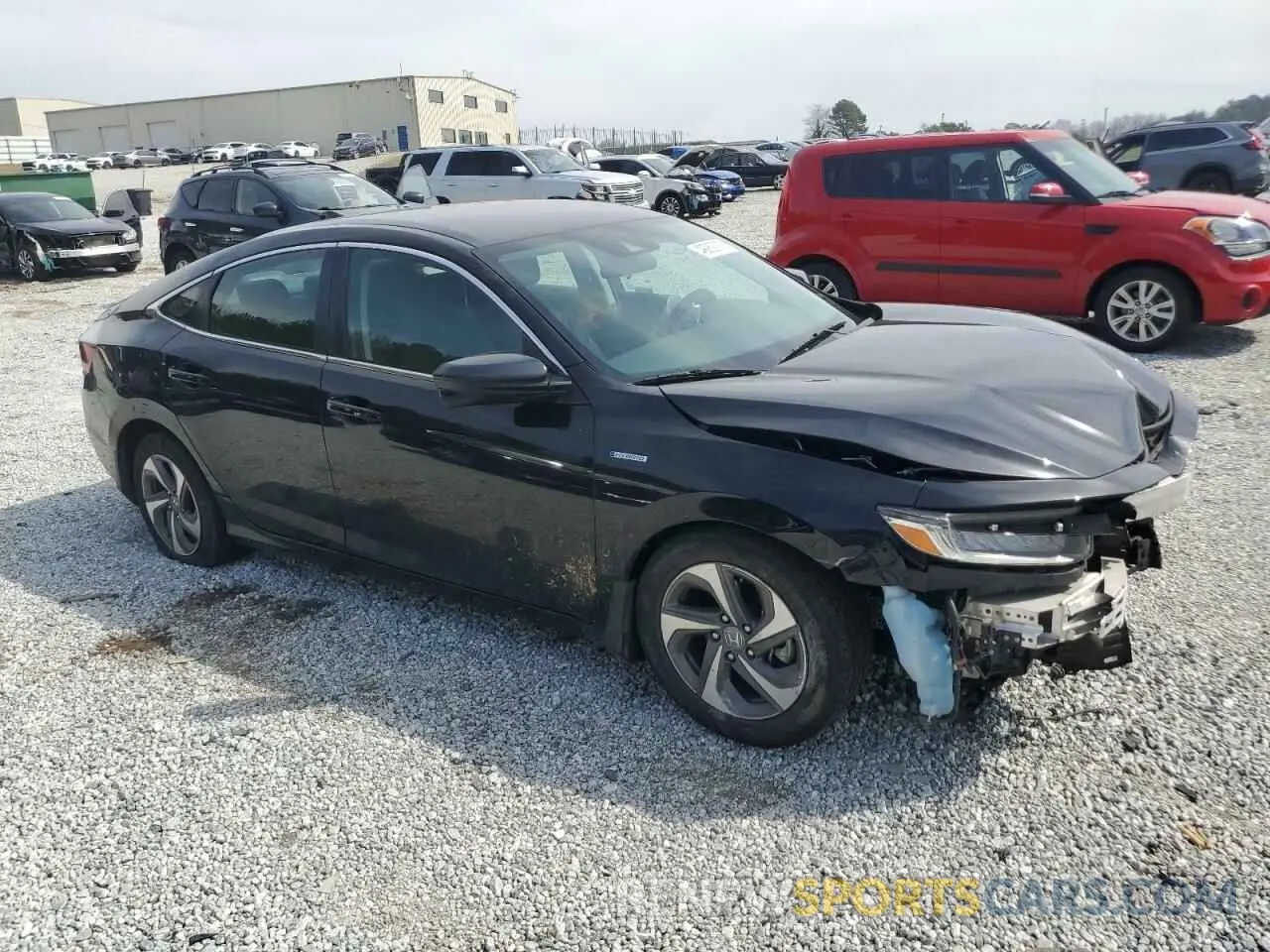 4 Photograph of a damaged car 19XZE4F55KE031676 HONDA INSIGHT 2019