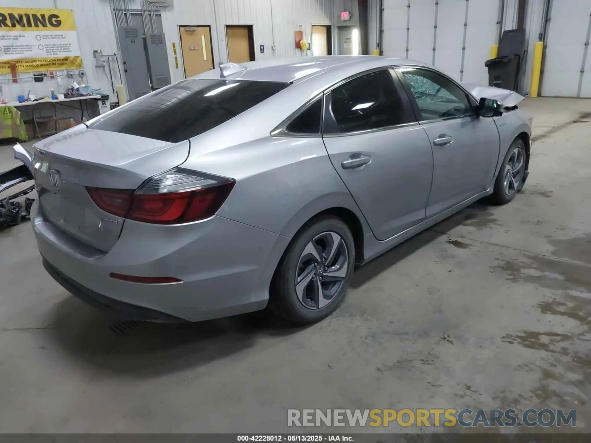 4 Photograph of a damaged car 19XZE4F59KE001869 HONDA INSIGHT 2019