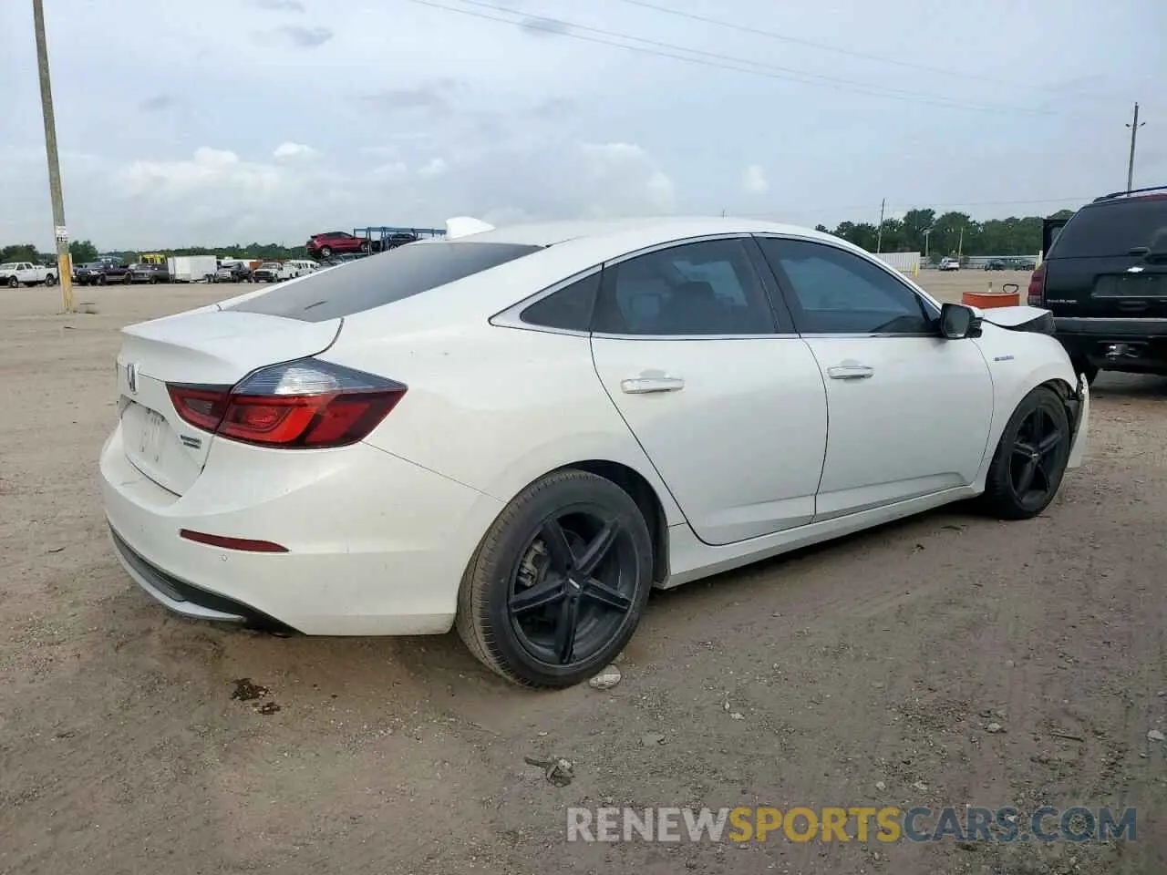 3 Photograph of a damaged car 19XZE4F91KE033721 HONDA INSIGHT 2019