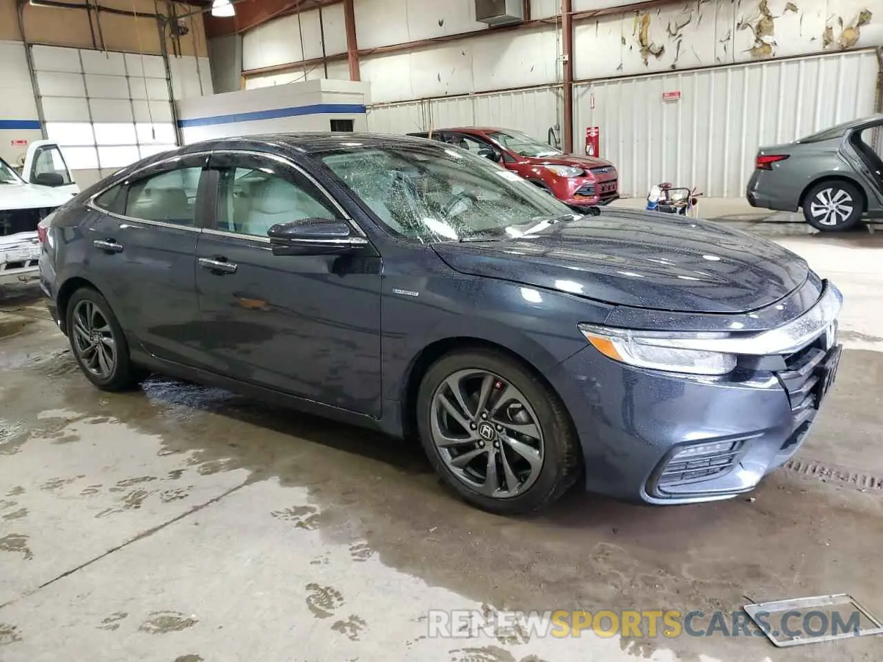 4 Photograph of a damaged car 19XZE4F92KE001800 HONDA INSIGHT 2019