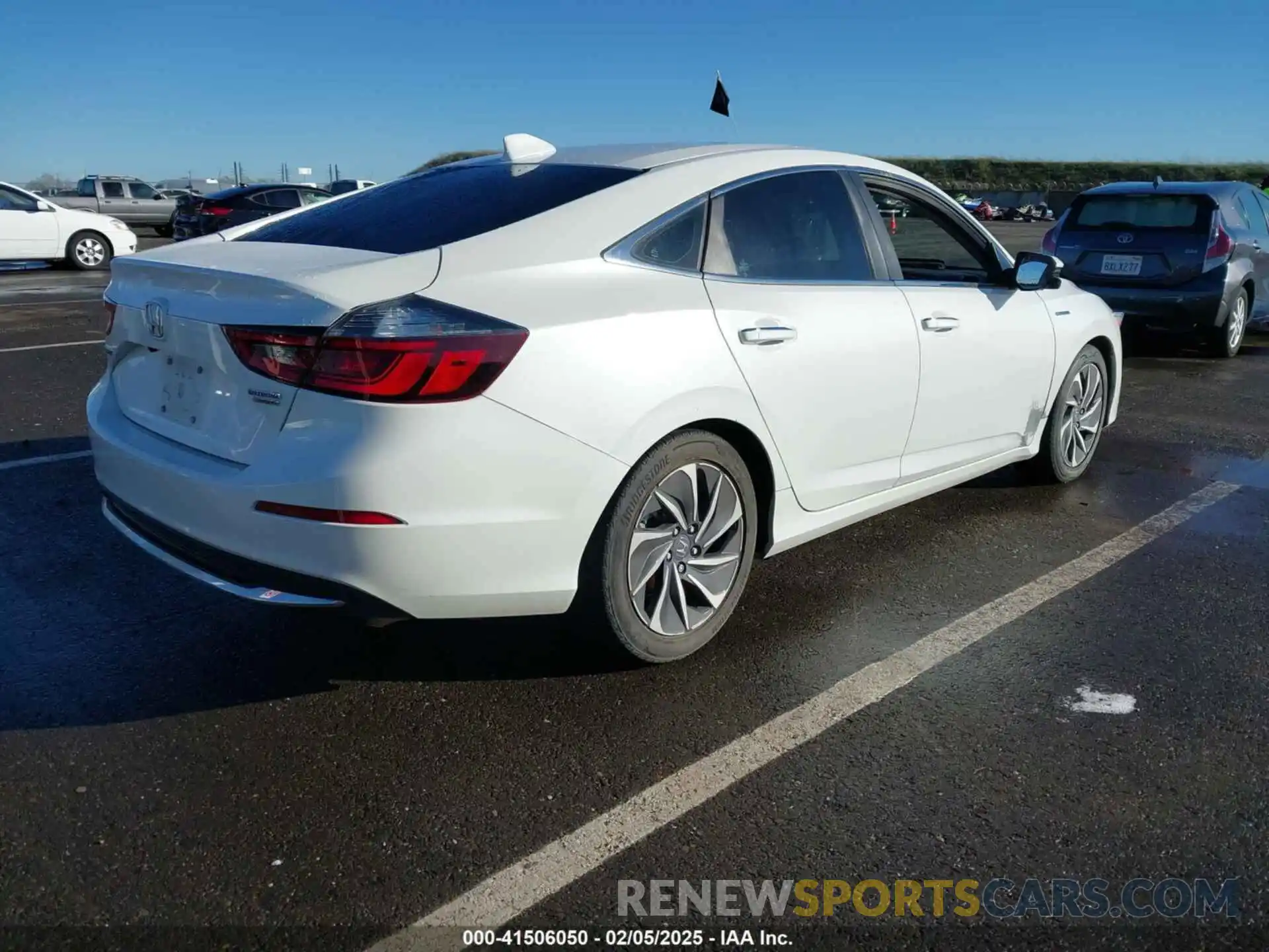 4 Photograph of a damaged car 19XZE4F92KE012764 HONDA INSIGHT 2019