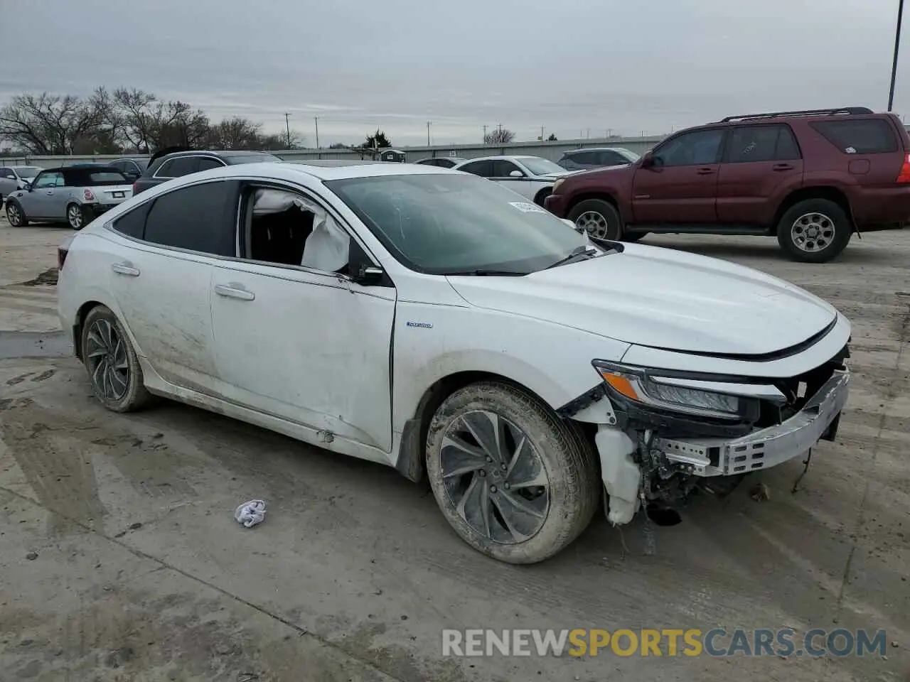 4 Photograph of a damaged car 19XZE4F92KE013543 HONDA INSIGHT 2019