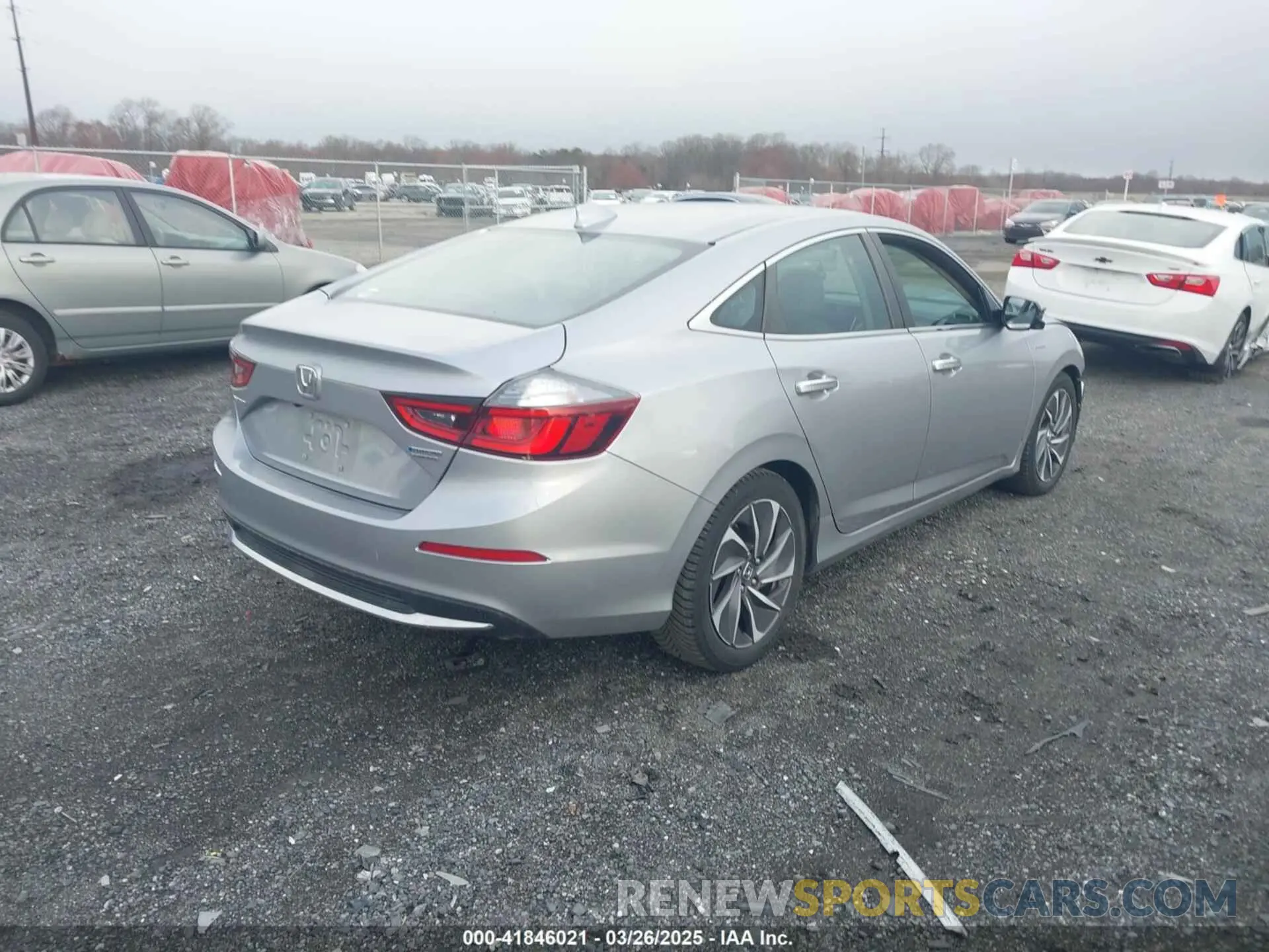 4 Photograph of a damaged car 19XZE4F93KE003037 HONDA INSIGHT 2019